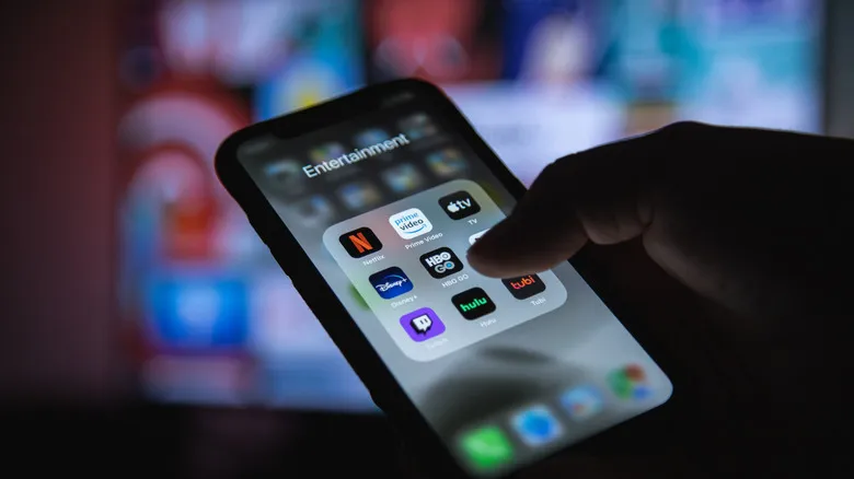 A smartphone with Netflix, Disney+ and other streaming apps.