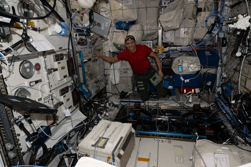 NASA astronaut Chris Williams unpacks computer hardware on the ISS on April 15th, 2026.