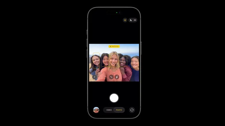 A screenshot of the iOS Camera app being used to take a group selfie.