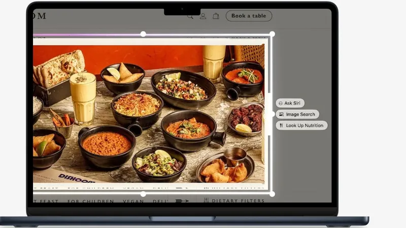 Laptop screen displaying a food photo editor, showing multiple bowls of colorful Indian dishes and snacks on a table, with editing handles and menu options like alt text and nutrition visible