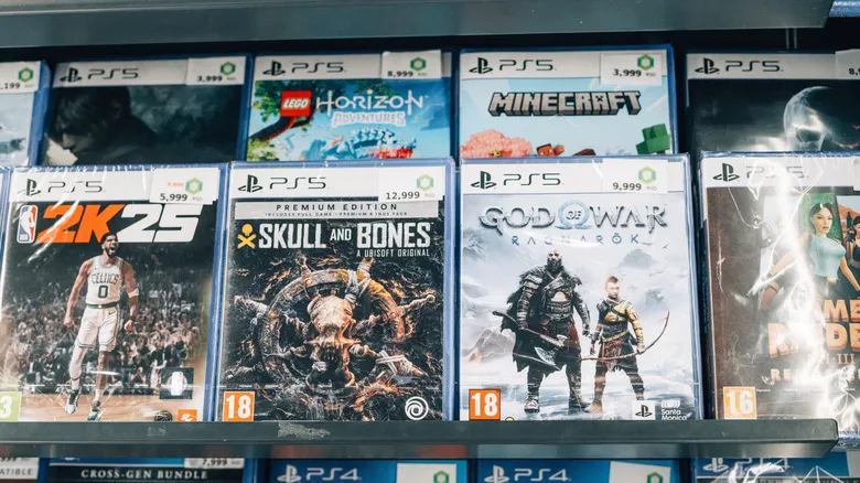Physical PS5 games in a retail store.